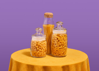 Different varieties of pasta in glass jars. Healthy food, delicious diet.