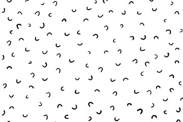 Uneven specks, sparse confetti, falling speckle, amid a doodle glaze donut motif