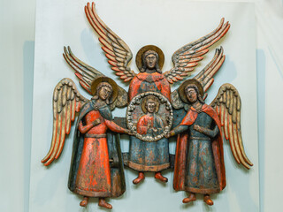 Perm wooden sculpture. Angels in the temple. Carved angels made of wood. Ancient sculptures in the...