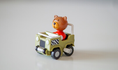 wind up toy car. bear figure