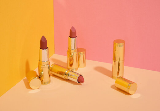 A few lipsticks for a stylish makeup look. Makeup products.