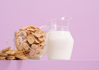 Healthy product with vitamins for breakfast. Wheat flakes and milk.