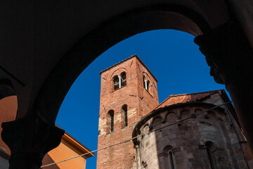 San Giusto (Saint Justus) Church medieval bell tower an apse in Lucca historica center - 747161716