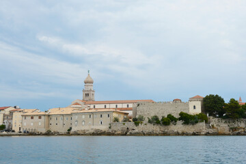 View of the Church of Assumption of the Blessed Virgin Mary and fortress walls in Krk, on Krk island in Croatia