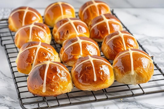 Hot cross buns arranged on a wire cooling rack. Generative AI - Powered by Adobe