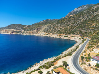 Drone view of the highway along the Mediterranean coast with sea and hills, Turkey. Beautiful, incredible seascape from a drone.