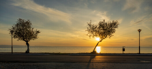 Tranquil scene of beautiful sea at sunset. Orange and yellow sunset on the sea. Aerial panoramic...