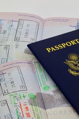 Travelers passport and international entry stamps