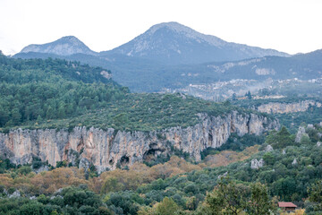 Fototapeta premium Amazing mountain view from scenic rocks and cliffs, Geyikbayiri, Turkey. Outdoor activity and recreation place.