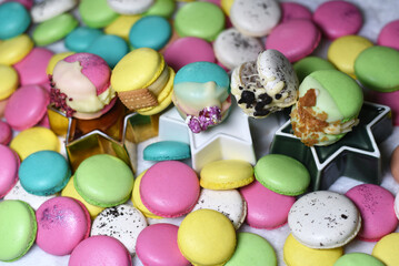 Lots of colorful macaroons. Bright background