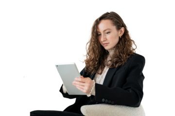 Creative specialist a young woman with glasses uses an office tablet. Transparent isolated background.