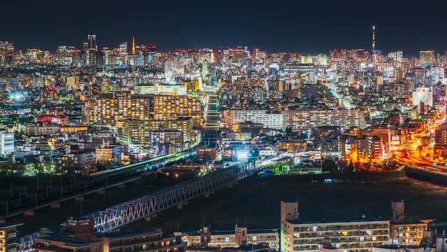 【東京都市夜景】東京と川崎を行き交う鉄道や車の光跡　タイムラプス　パンライト　
Tokyo city night view. Light trail of railways and cars traveling between Tokyo and Kawasaki city - Japan - Timelapse video - pan right