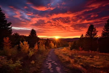 Raamstickers Fall's Grand Finale: An ethereal Autumn sunset over picturesque landscape © Marguerite