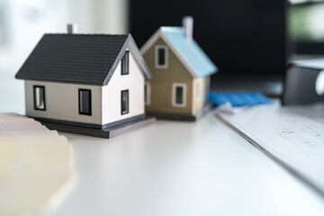 Obraz na płótnie Canvas Real estate planning concept with miniature houses
