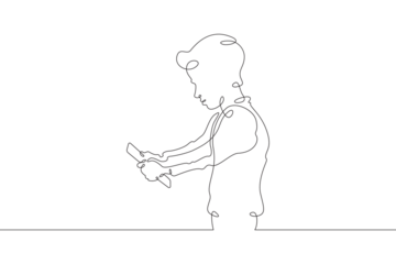 A child stands with a phone in his hand. A boy is talking on a smartphone. One continuous line . Line art. Minimal single line.White background. One line drawing.