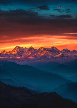 Majestic sunset over layered mountain ranges. Generative AI image