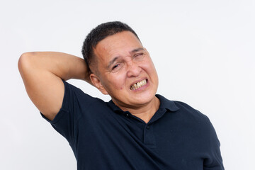 A middle-aged Asian man experiencing severe neck pain, depicting symptoms of whiplash, against a white background.