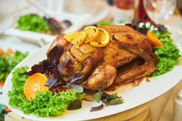 Delicious mouth-watering grilled chicken stuffed with fruits. A festive dish