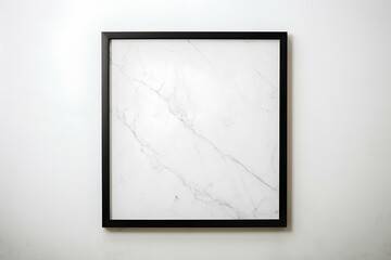 A minimalist black frame hanging on a pristine white marble wall, creating a sophisticated and timeless composition.