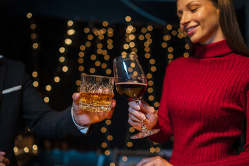 Barwoman pouring whiskey whiskey glass..