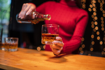 Celebrate whiskey on a friendly party in restaurant