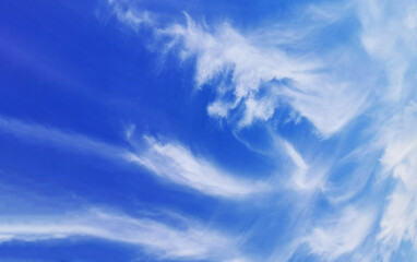 Blue sky with white clouds. Horizontal orientation, background