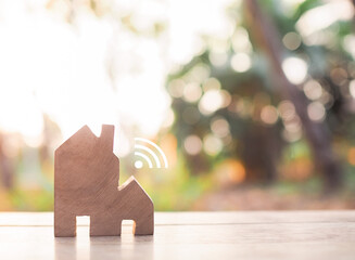 Miniature house with Wifi signal. The concept of network connect, internet of things, smart home...