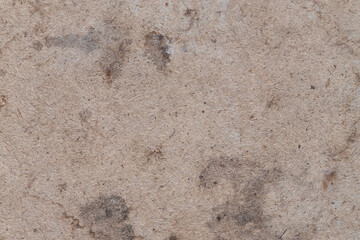 Old cardboard or craft paper with streaks and scuffs