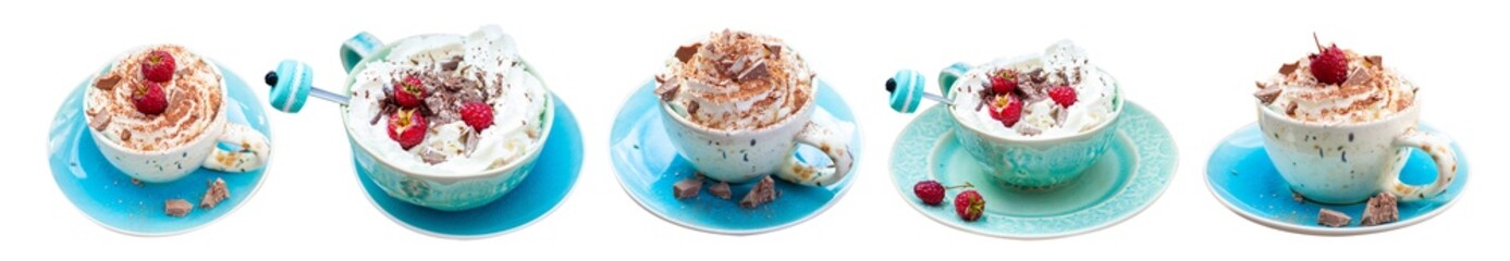 A beautiful blue cup of coffee with whipped cream, cocoa powder and raspberries on rustic wooden background