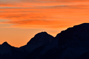 Mountain Peak landscape in orange sunset la Clusaz France