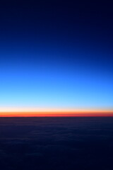 View of sunset from Airplane Window colorful