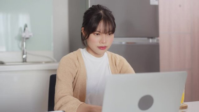 Asian woman working from home, Remote work