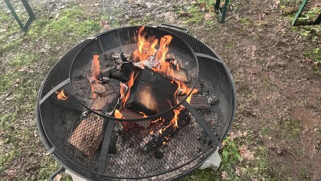 Open fire in the fire bowl in slow motion