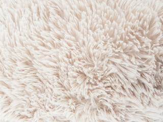 Fuffy soft textile material texture background.