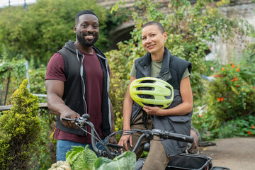 Portrait of smiling couple in vegetable garden