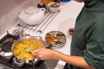Woman cooking at home