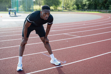 Obraz premium Athlete training at sports track