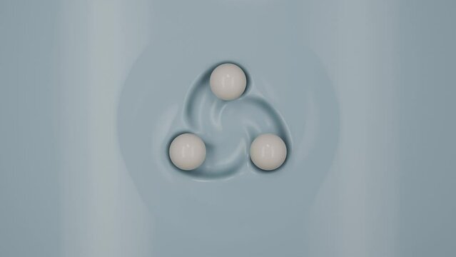 A looping 3D animation of a blue cream surface over which three white milk drops fly in a spiral, merging and separating. Drops leave a mark on the surface. Loop animation