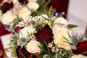 Luxurious Wedding Bouquet with Red and Cream Roses