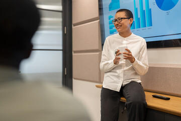 Leader making presentation in office