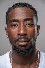 Portrait of pierced man looking at camera