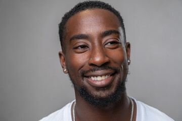 Portrait of pierced man smiling