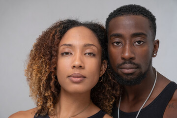 Portrait of couple looking at camera