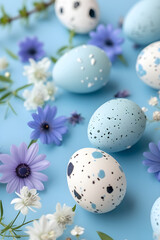 Naklejka na ściany i meble hoto with colored Easter eggs and spring flowers on blue background. Happy Easter concept banner. Top view design for spring  template, card, poster, ads.