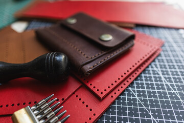 Genuine Italy vegetable tanned leather working leather wallet brass on leather background - 747298384