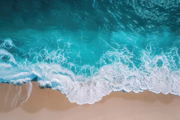 Poster The calm of ocean waves on a deserted beach, turquoise sea and untouched sands aerial view of a peaceful, deserted beach with calm ocean waves gently breaking against sandy shores © khwanrudi