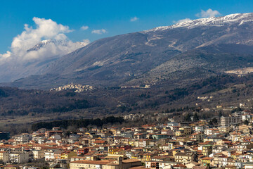 Fototapeta na wymiar Celano, Italy A panormaic view of the city against the mountains.