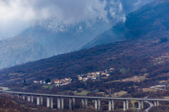 Cocullo, Italy A view of the mountains and the elevated E80 highway through the valley.