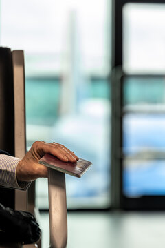 Rome, Italy A woman holds a Swedish passport while waiting at the gate at the Leonardo Da Vinci Fiumicino airport.
