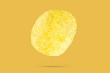 potato chip isolated on yellow background